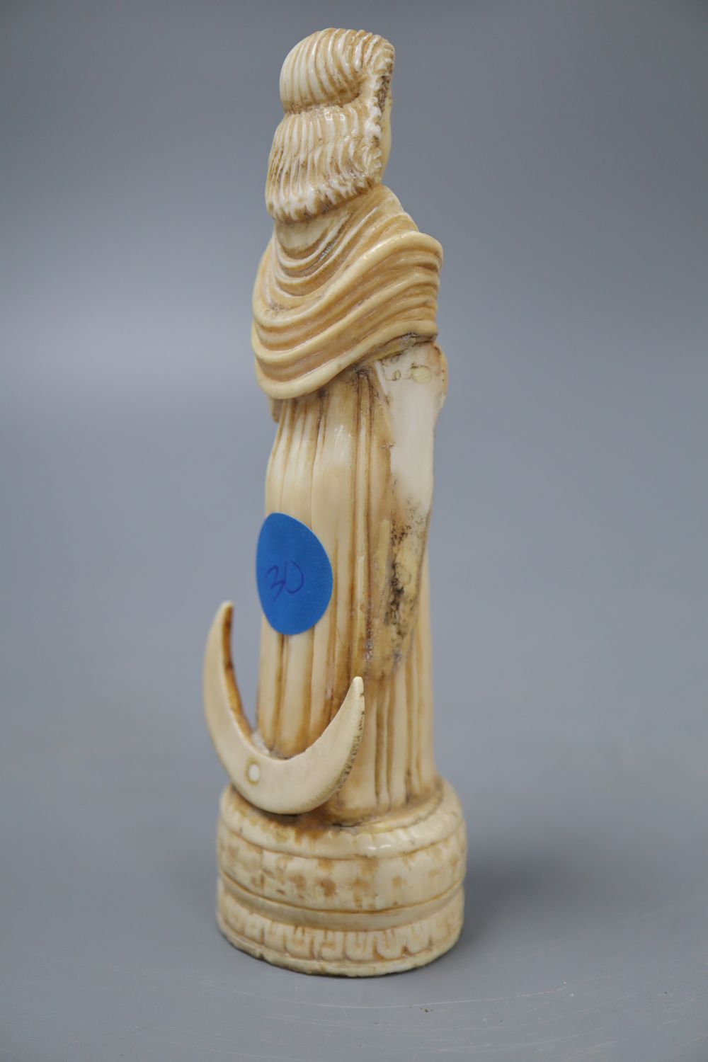 An 18th century Indo-Portuguese ivory carving of a saint, height 14cm